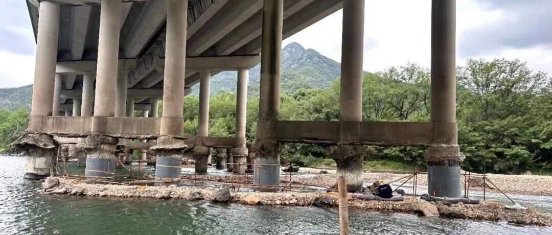 FRP sleeve pile repair system for underwater bridge pier restoration