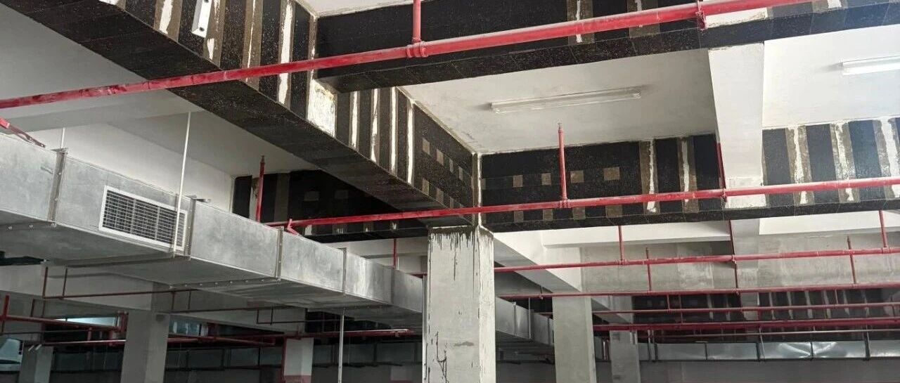 Underground Parking Garage Structural Reinforcement: CFRP + Steel Plate Bonding Case Study