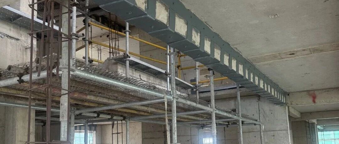 Public Housing Structural Reinforcement: Steel Plate Bonding + CFRP Strengthening